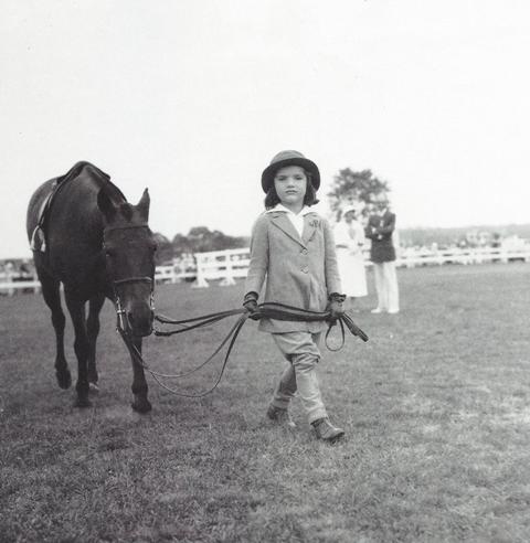 Jacqueline Bouvier Leading a Pony, August 1934, Southampton Riding & Hunt Club by Bert Morgan. 