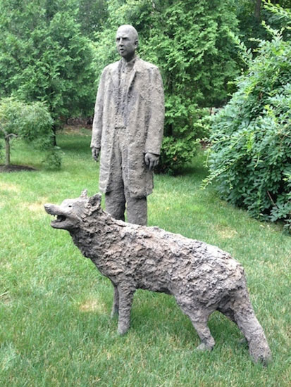 "Dirt Man With Wolf" by James Croak. Cast Dirt. Photo by Annette Hinkle. 