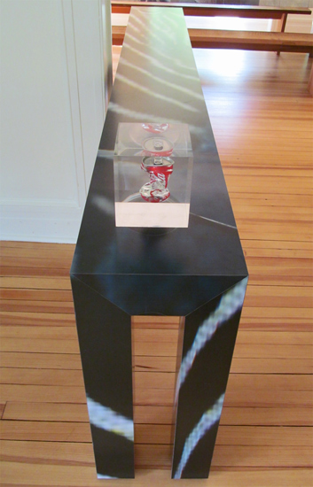 "Halfzebra_Red_Table" by Guyton Walker, 2012. Table, 94 x 30 x 12 inches.