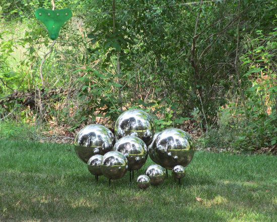 "These VI" by Lisa Beck, 2012. Stainless steel and aluminum rods, 61.5 x 38 inches.