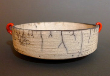 "Hand Built Stoneware Bowl" by Megan Hergrueter. Raku fired, 4 x 9 inches. 