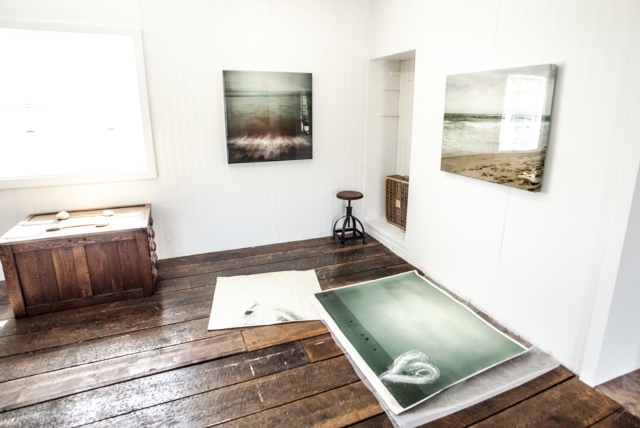 Window to the sea with Graybill's seascape photos. 