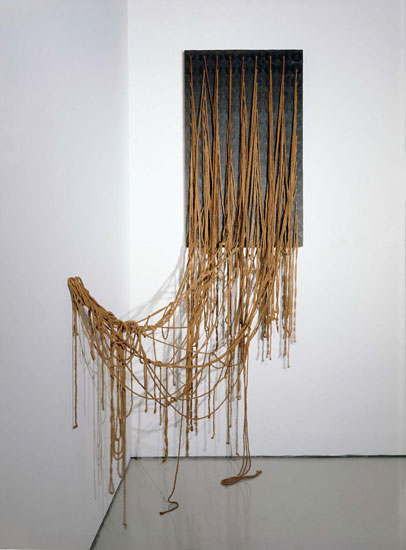 "Ennead" by Eva Hesse, 1966. Acrylic, papier mâché, plastic, plywood, & string, 96 x 39 x 17 inches. Collection of Barbara Lee, Cambridge, Massachusetts, Photo by Abby Robinson, © The Estate of Eva Hesse, courtesy of Hauser & Wirth. 