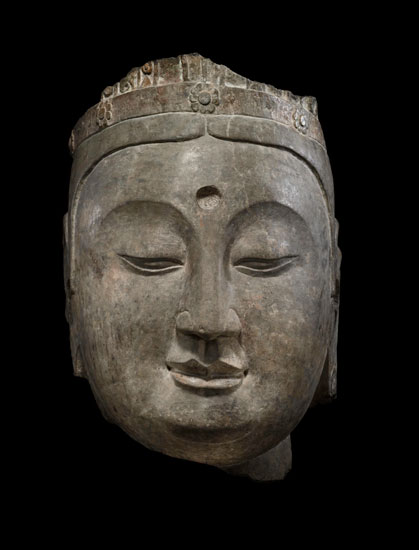 Northern Qi (550-577). Head of a Bodhisattva, Sandstone, 13 3/8 x 7 1/4 x 7 3/4 inches. Sackler Collections, Columbia University Art Properties, Avery Architectural & Fine Arts Library,  Columbia University in the City of New York, Sackler Collections.  