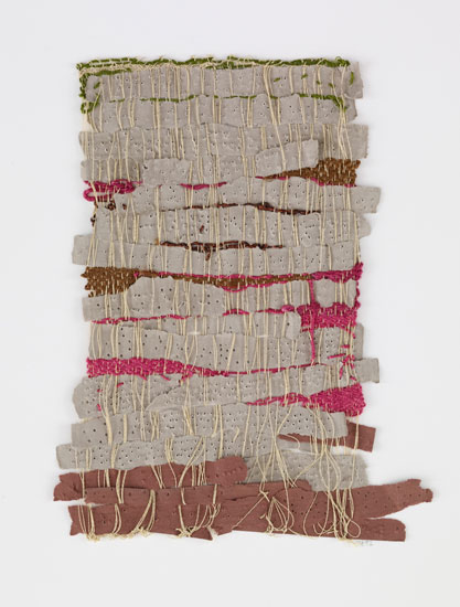 "Punched Notations" by Sheila Hicks, 2012. Paper and synthetic yarn, 9 1/2 x 7 1/2 inches. Andrea and José Olympio Pereira Collection.