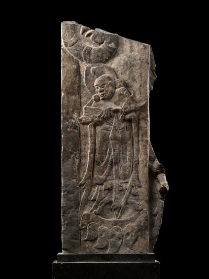Late Northern Wei (386-534), Relief with Guardian Figure. Limestone, 24 1/8 x 11 x 4 1/2 inches. Sackler Collections, Columbia University. Art Properties, Avery Architectural & Fine Arts Library, Columbia University in the City of New York, Sackler Collections. 