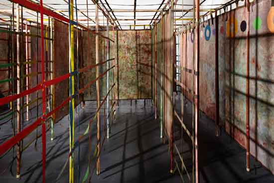 "Maze" by Alan Shields, 1981-1982. Acrylic and thread on canvas, cotton belting, Velcro and aluminum pipe, 87 x 219 x 219 inches. Estate of the artist, courtesy Van Doren Waxter, New York. Photo by Daniel Gonzales. 