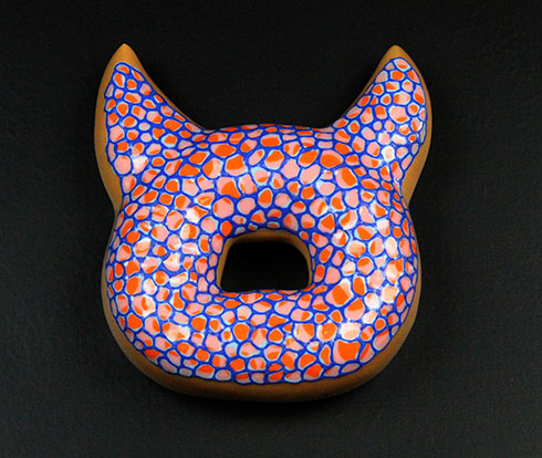 Donut sculpture by Jae Yong Kim, 2014. Fired clay, glaze and underglaze, 4 x 4 x 1.5 inches.