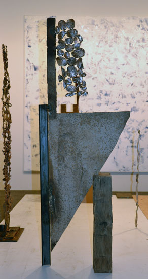 Bronze sculpture by Graham Collins exhibited with The Journal Gallery (Brooklyn) at NADA Miami Beach. In rear is a painting by Chris Succo. Photo by Pat Rogers.