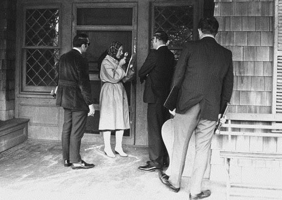 Little Edie Bouvier Beale on the porch looking at the notice from the Health Department. Photo courtesy of Bay Street Theater. Originally published by The East Hampton Star.