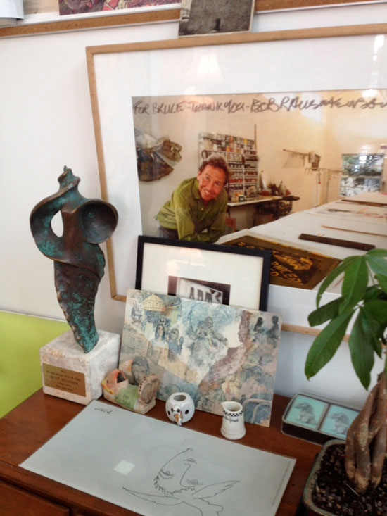 Bruce Helander's studio table with inscribed Rauschenberg photo. Photo by Sandra Hale Schulman. 