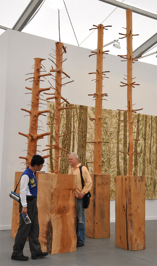 "Albero di 8 m, 2000" and "Albero di 10 m, 1989" by Giuseppe Penone. Wood. Exhibited with Marian Goodman Gallery. Photo by Sage Cotignola. 