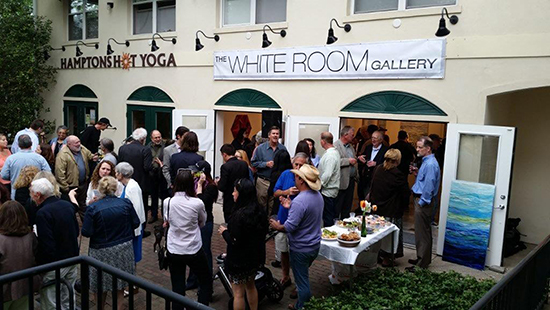 Crowd at the White Room Gallery. Photo by Daniel Schoenheimer. Courtesy of The White Room Gallery.