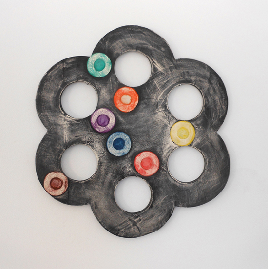 "Six Circles" by Joyce Robins, 1998. Clay, glaze, paint, 16 x 14.5 inches.