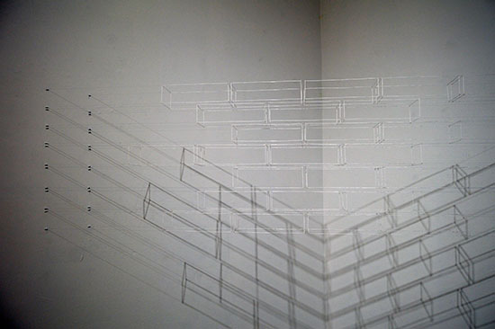 "Muro sin sombras" by Ronald Morán, 2016. White thread, dimensions variable.