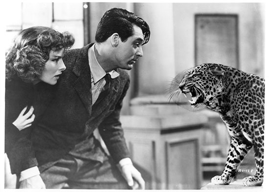 Fr. “Bringing Up Baby,” Cary Grant and Audrey Hepburn with the pet leopard.