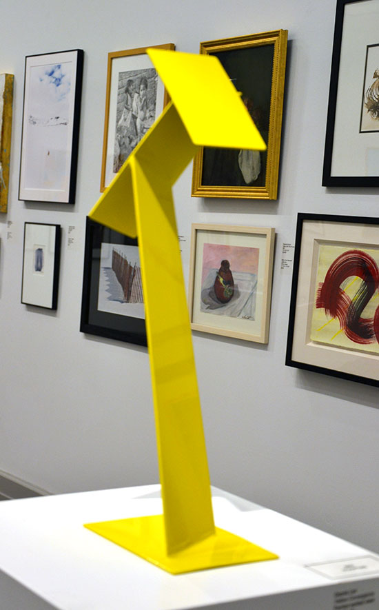 "Yellow Convergence" by Dennis Leri. Painted welded steel, 20 x 7 x 5 inches. Photo by Pat Rogers.