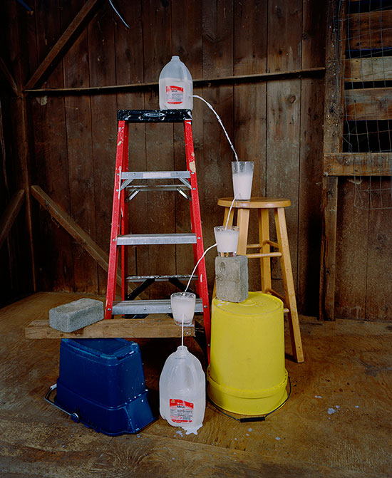"Transferring a gallon of milk from one container to another" by Adam Ekberg, 2014. Archival pigment print, 50 x 40 inches, Courtesy of the artist and ClampArt, New York City.