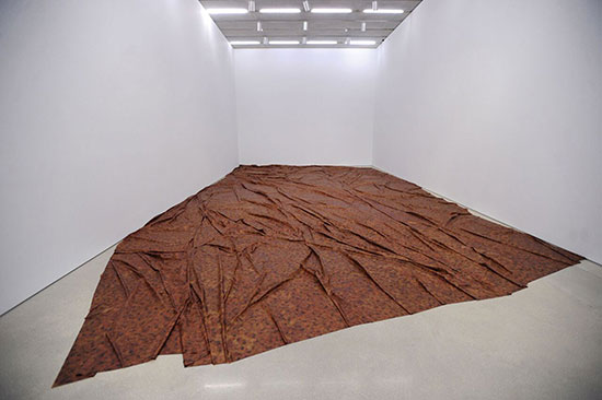 "A Flor de Piel" by Doris Salcedo, 2014. Rose petals and thread, 525 x 256 inches. Installation view, Pérez Art Museum Miami, 2016. Courtesy of the artist. Photo: World Red Eye.