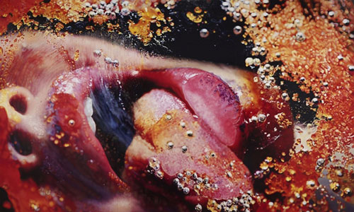 "Orange Crush" by Marilyn Minter, 2009. Enamel on metal, 108 x 180 inches. Private collection. Courtesy of the Brooklyn Museum.
