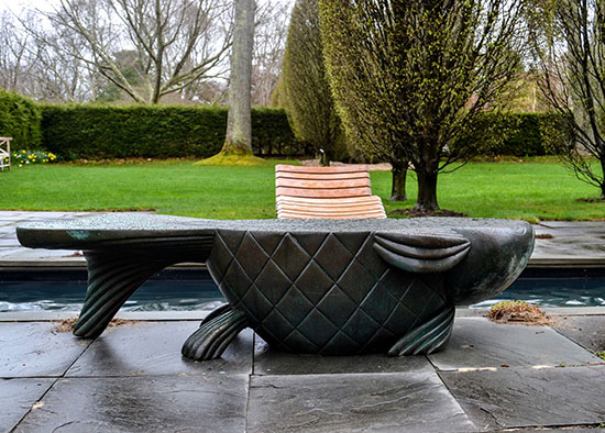 "The Fish Bench" by Judith Kensley McKie, 1999. Cast Bronze, 18 x 76 x 29 inches. Photo by Dawn Watson.
