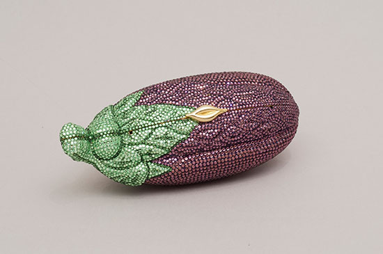 "Purple Eggplant-shaped Minaudière with Crystal Rhinestones" by Judith Leiber, 1988. 3 1/2 x 6 1/2 x 3 inches. The Collection of Mrs. Saini Kannan. Courtesy of The Leiber Collection. 