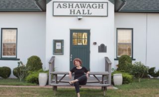 Springs Invitational Curator Teri Kennedy at Ashawagh Hall. Photo by Christine Newman. Courtesy Teri Kennedy.