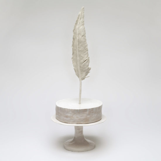 "One Tall Feather" by Monica Banks. Glazed English Porcelain, 8 x 7 1/4 x 7 inches. Courtesy Sara Nightingale Gallery.
