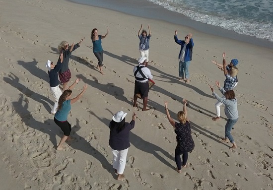 Video still of a dance in progress as part of "The Radiance Project" at Flying Point Beach, Water Mill, NY. Video still by Tyus Gholson. Image courtesy of Andrea Cote and the Southampton Arts Center.