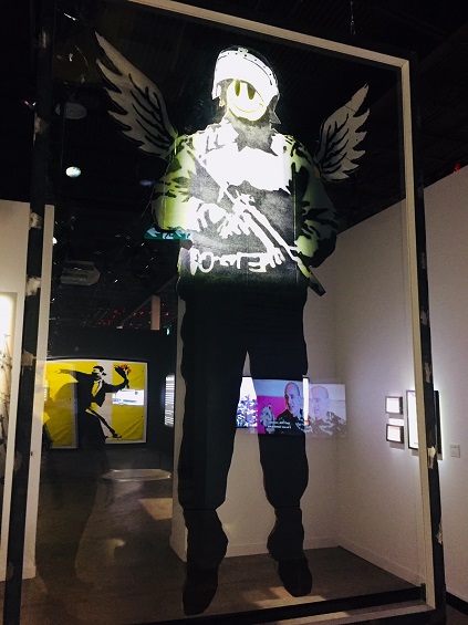 Installation of artwork by Bansky in the exhibition "The Art by Bansky" in Miami. Photo by Sandra Schulman.