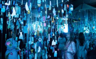 “Pieces of You: Much Ado About Something” by Cindy Pease Roe, 2018. The chandelier is made up of marine plastics (collected on Long Island) woven with fiber optic lighting. On view at Acadia.Earth in Miami. Courtesy of the artist.