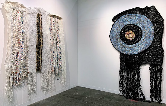 "Chari / Blanket" and "Eversharp Blue Pen" by Moffat Takadiwa, 2019 exhibited with Nicodim Gallery at The Armory Show 2019. Photo by Joanna Gmuender.