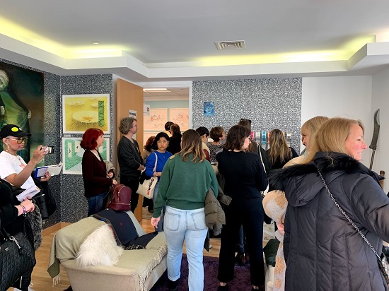 A crowd gathers at "TV GUIDE" curated by Jennifer Dalton, Jennifer McCoy and Kevin McCoy at Spring/Break Art Show 2019. Photo by Joanna Gmuender. 