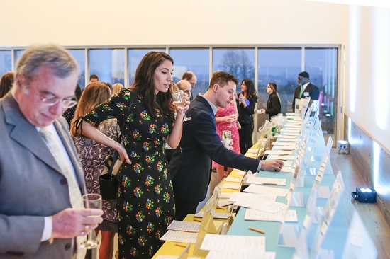 Perusing the Silent Auction at the Parrish Art Museum’s 2019 Spring Fling benefit. Photo by Eric Striffler. Courtesy of the Parrish Art Museum.