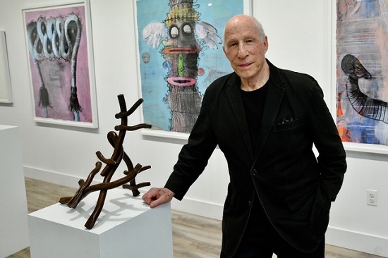 Artist Richard Heinrich with his work at "Paint and Steel" at ILLE Arts. Photo by Jared Siskin. Courtesy of Deborah Buck.