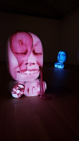 "EntroP" and "Crypto B" by Tony Oursler, both 2019. Acrylic, resin, steel, blown glass, with sound and the voices of multiple performers as installed at Guild Hall. Photo by Pat Rogers. 
