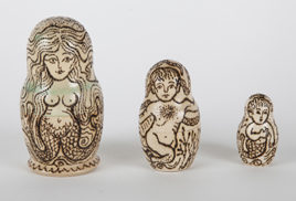 "In the Beginning" by Caroline Waloski. Heat engraved image on wooden nesting dolls box, 2 x 3.5 inches. Courtesy of the artist.